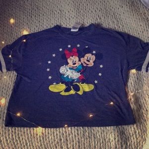 a blue crop top shirt with Minnie and Mickey.